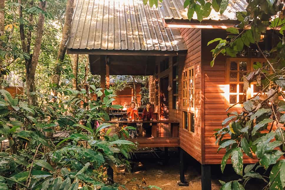 Kinabatangan River Borneo: guide to a bucket list jungle experience Our kids by our bungalow at our Kinabatangan River Resort
