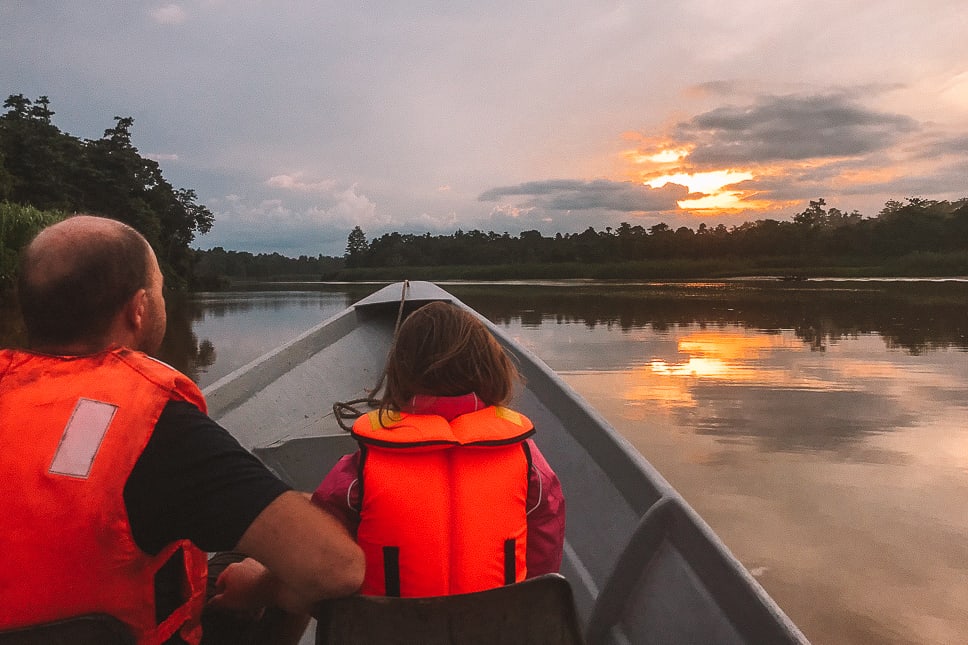 Kinabatangan River Borneo: guide to a bucket list jungle experience Enjoying sunset over the Kinabatangan River with kids in Borneo