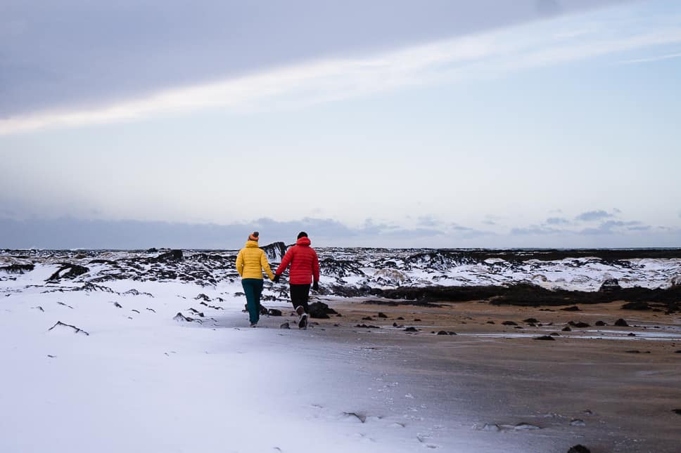 What to wear in Iceland in winter: the best clothing for Iceland from October to April Beach Eyrarbakki one week itinerary Iceland