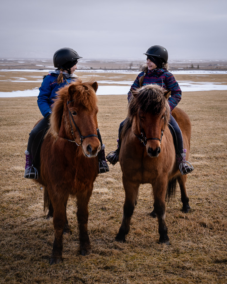 15 best and most impressive things to do in Iceland two kids on icelandic horses in iceland
