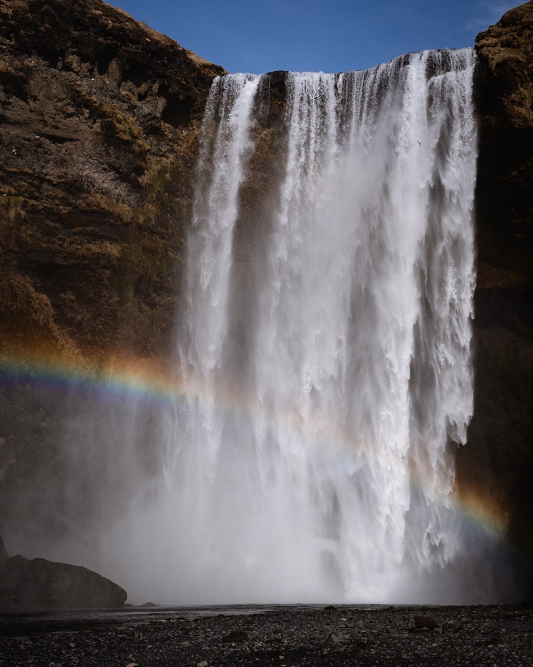 Skogafoss waterfall in Iceland with rainbow