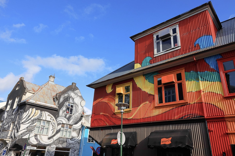 The best things to do in Reykjavik, Iceland + TIPS colorful houses with street art in reykjavik in iceland