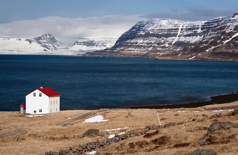 20+ Best things to do in Iceland: Our Ultimate Iceland Bucket List View of the mountains, the sea, and a fishing cottage in the Westjords in Iceland