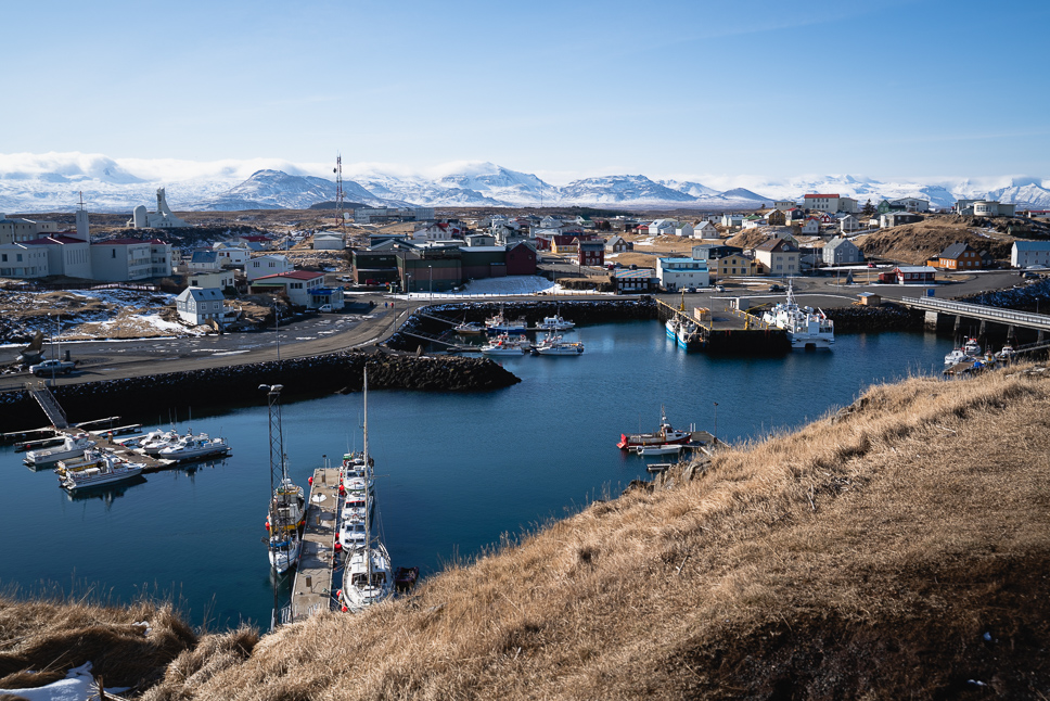 Snaefellsnes Peninsula in Iceland: the best things to do + itinerary View over the harbor and houses with restaurants in Stykkishólmur on Snaefellsnes in Iceland