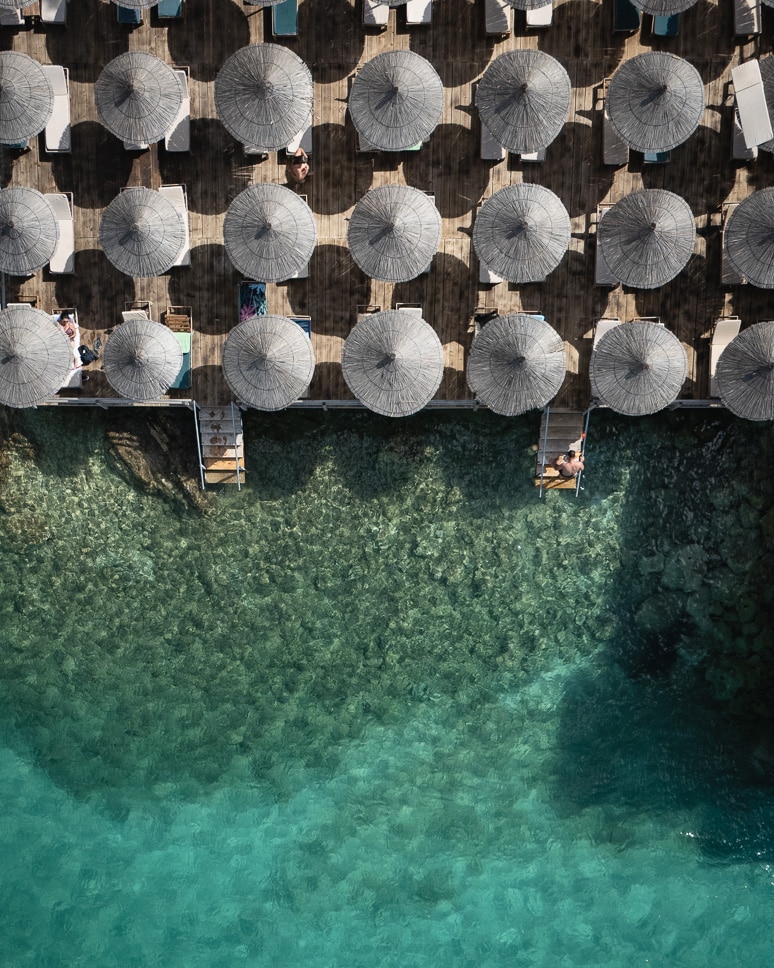 Albania road trip: our ultimate itinerary for 10 days to 3 weeks a beach bar in ksamil