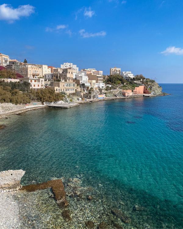 What to do on Syros: Our favourite island in the Cyclades Beautiful colors of the water at Asteria Beach