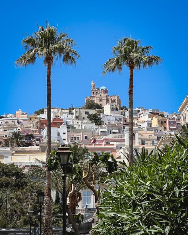 What to do on Syros: Our favourite island in the Cyclades View from Ermoupoli of one of the churches