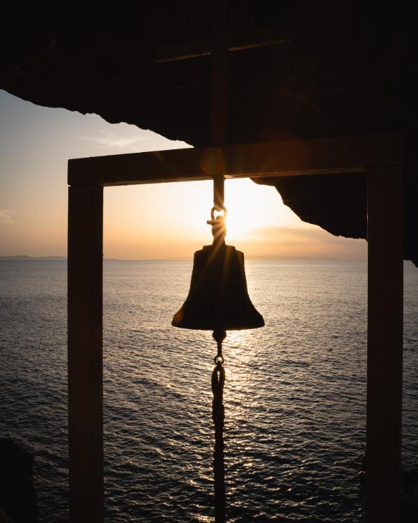 What to do on Syros: Our favourite island in the Cyclades Beautiful sunset at the Saint Stefanos Chapel in Syros.