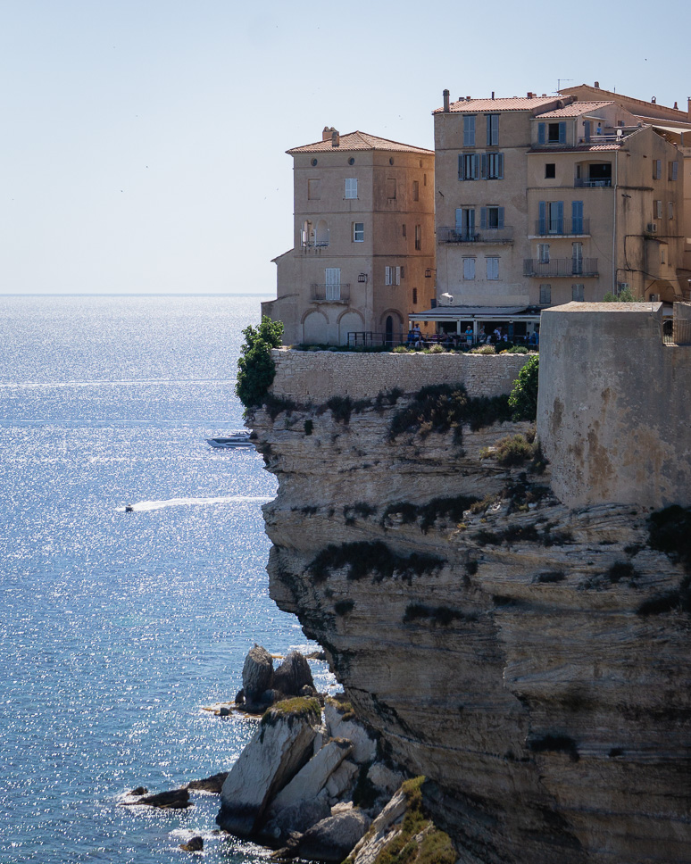 Houses on top of a white cliff in the citadel of Bonifacio in Corsica